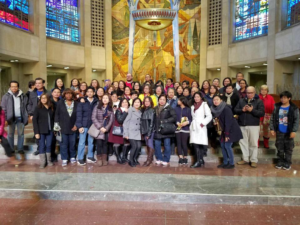 NY OFWs ENTER THE HOLY DOOR