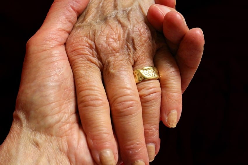 marriage renewal old couple hands