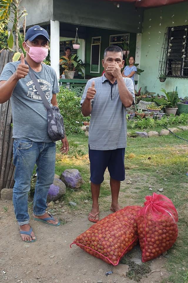 Patrick Ibrahim, distributing harvested calamansi to barangays (Photo from his Facebook page)