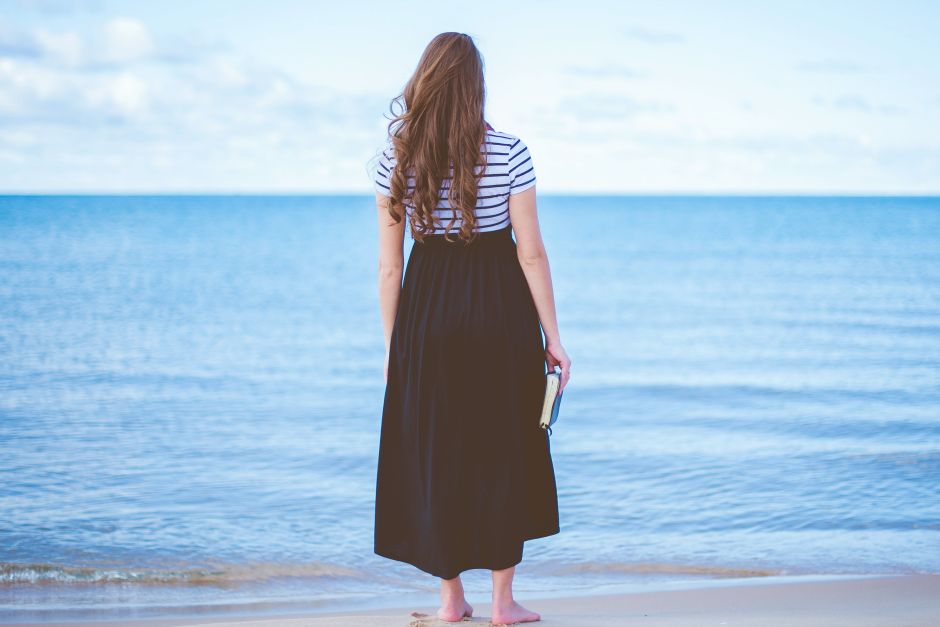 Woman on a beach stock Modesty Purity Photo by Ben White