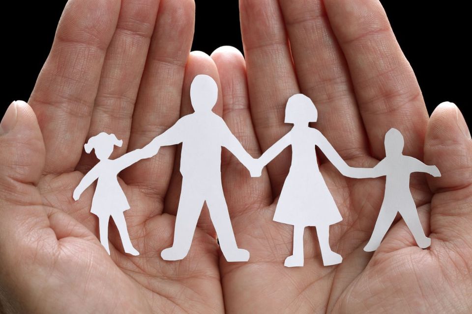 family paper cutting hands stock