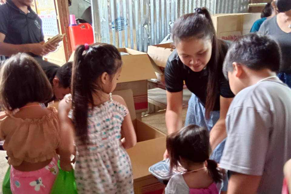 Parish Soccom gift-giving at New Carmen Archdiocesan Nutrition Center