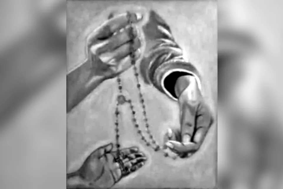 editorial hands holding rosary